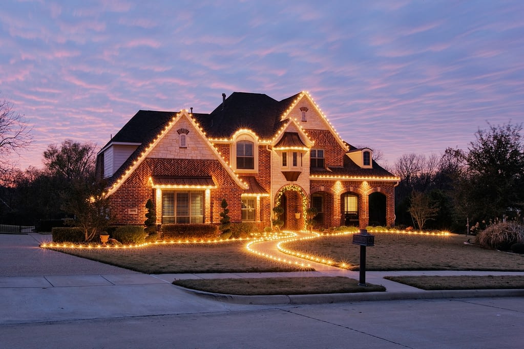 Home Roof Decorated with Christmas Lights